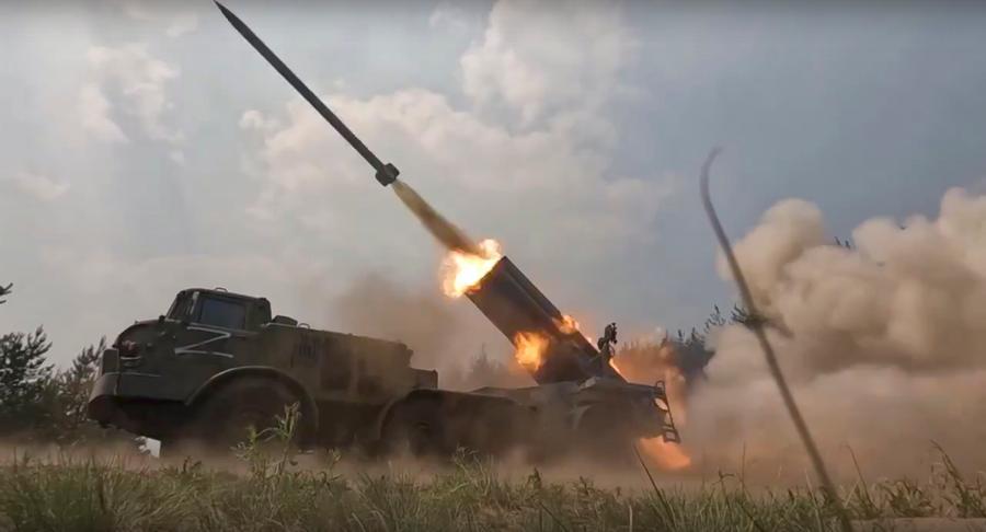 In this handout photo by Russian Defense Ministry Press Service released on Saturday, June 25, 2022, a Russian military's multiple rocket launcher fires rockets at Ukrainian troops at an undisclosed location. (Russian Defense Ministry Press Service via AP)