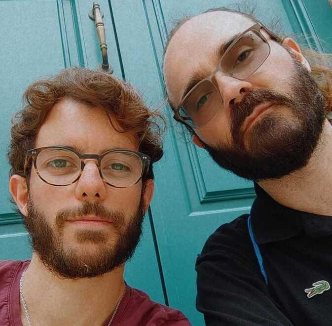 Gabriele con  Alessandro e davanti al palazzo comunale dove lavora ai servizi sociali