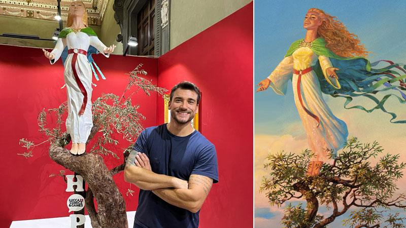 Il pasticcere Damiano Carrara con la scultura di cioccolato che rappresenta la Dama Hope di Ted Nasmith simbolo dell’edizione 2022 dei Comics