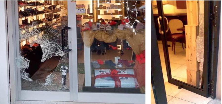 A sinistra la vetrina sfondata della Farmacia comunale in via XXIV Maggio e di lato la porta senza vetro dell’Antico Caffè Toti