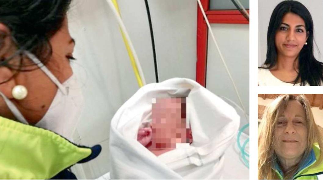 Il maschietto nato in ambulanza in braccio al medico del 118 e a lato la dottoressa Mary e la volontaria della Misericordia di Piombino Lucia Taddei