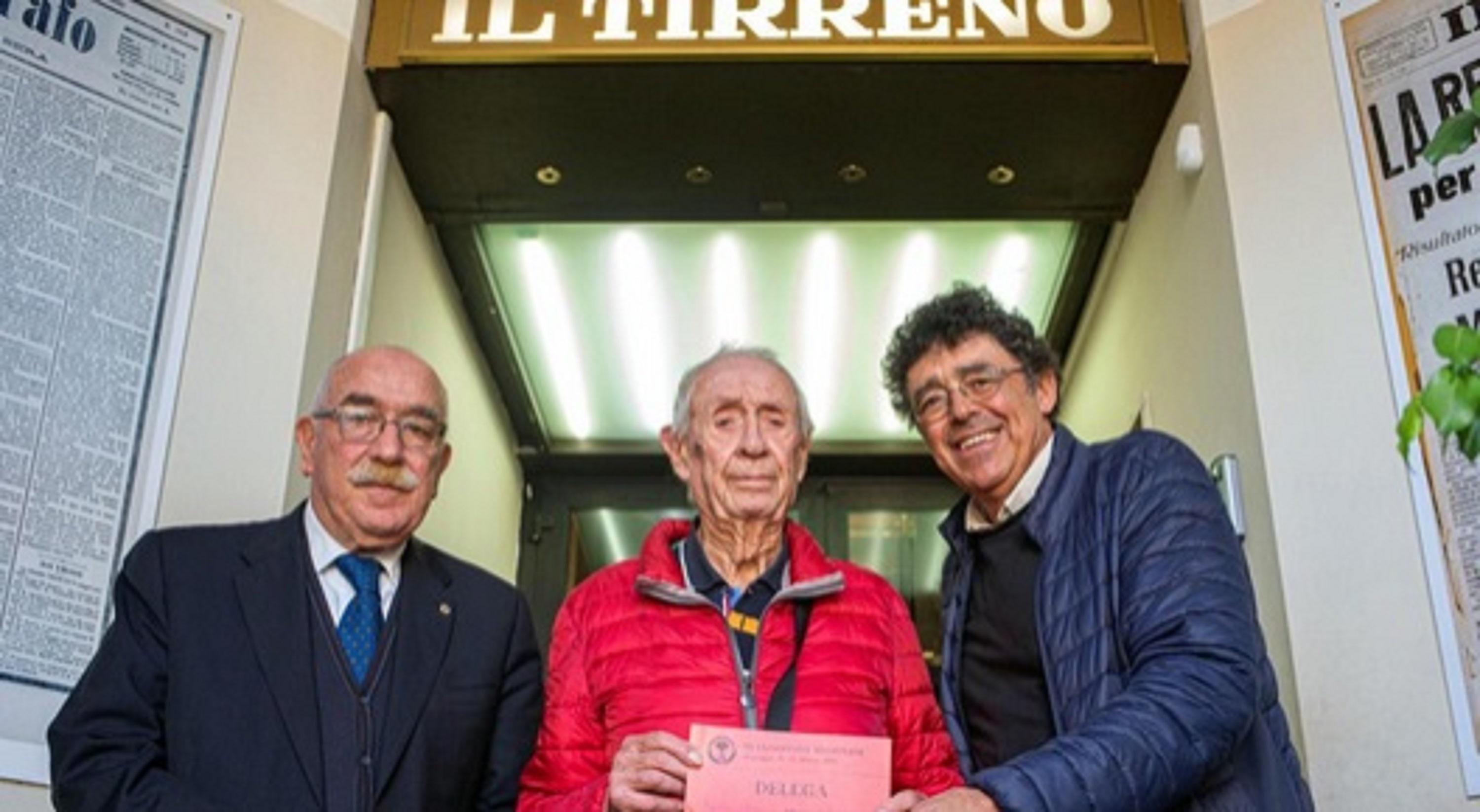 Al centro Elio Agretti