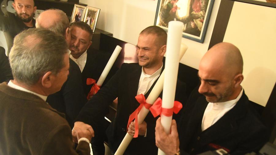 Al centro della foto Danilo Casula durante la cerimonia della Candelora