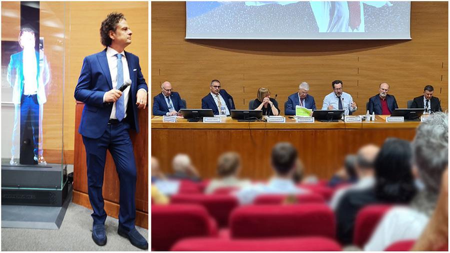 
	Andrea Bellucci (e il suo ologramma) e i relatori

