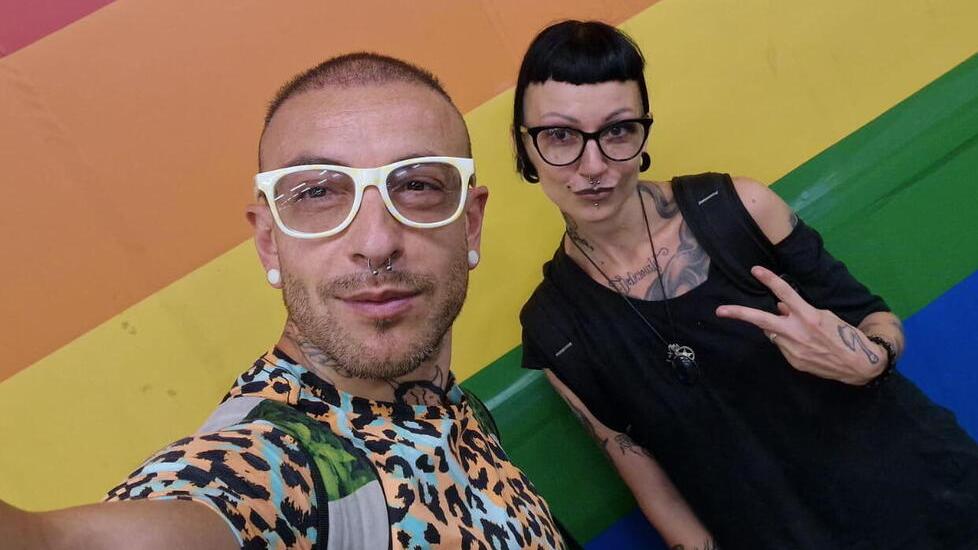 Simone Romano portavoce del gruppo di artigiani e negozianti di via Garibaldi e la moglie Elena Bertone