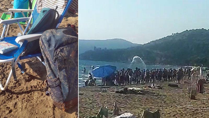 Zaino imbrattato di sabbia e il gruppo in azione con i gavettoni