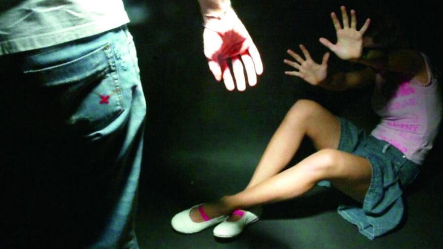 Violenza su una donna (foto d'archivio)