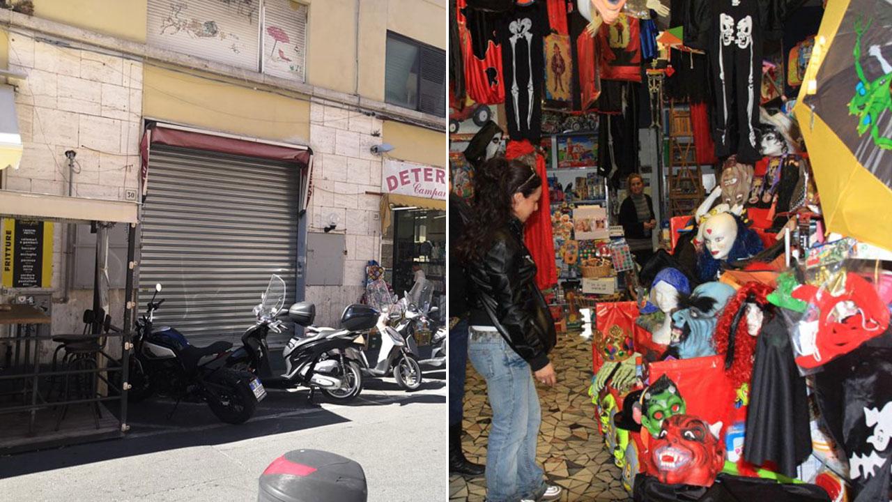 L’interno del Paese dei Balocchi e le serrande chiuse in via del Cardinale