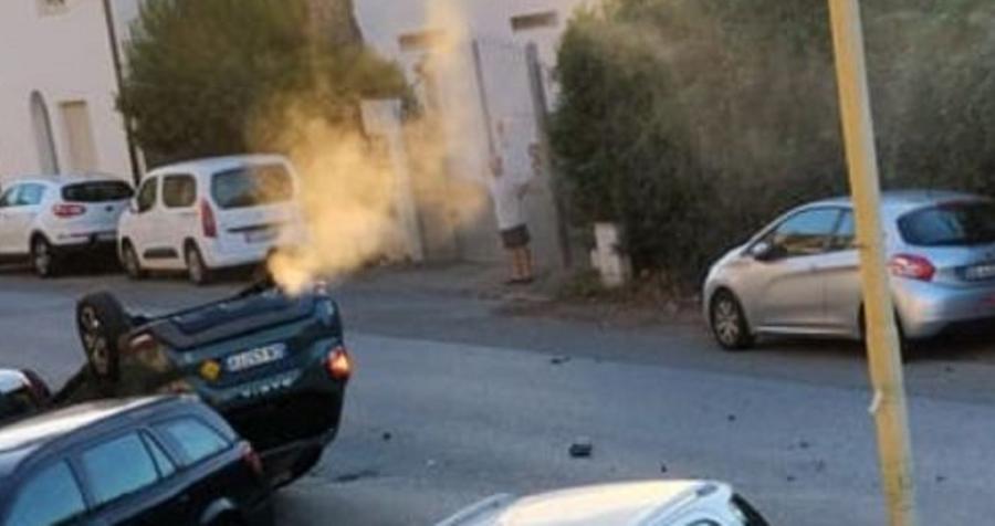 
	L'auto ribaltata

