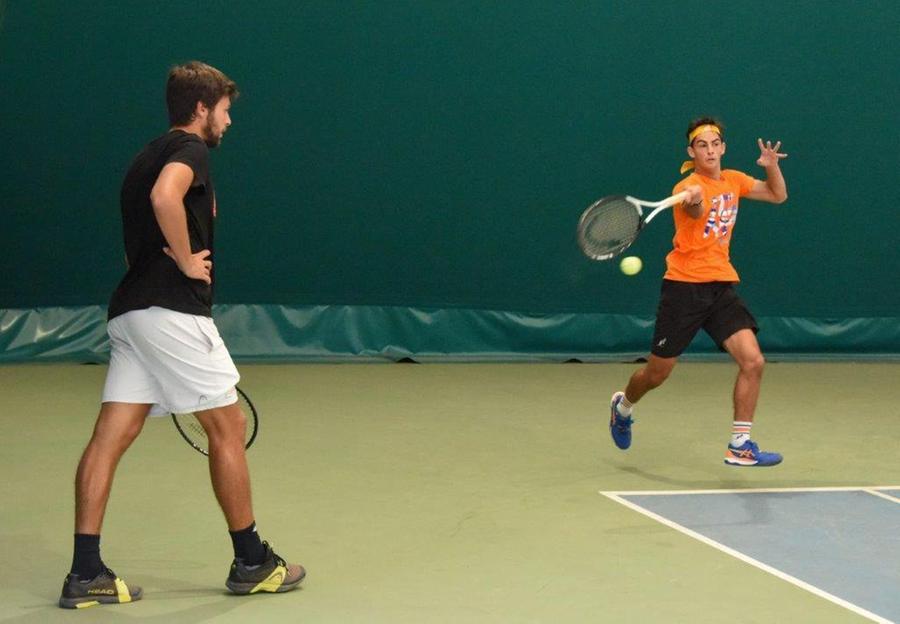 
	Lorenzo Carboni in allenamento seguito dal coach Gianluigi Quinzi

