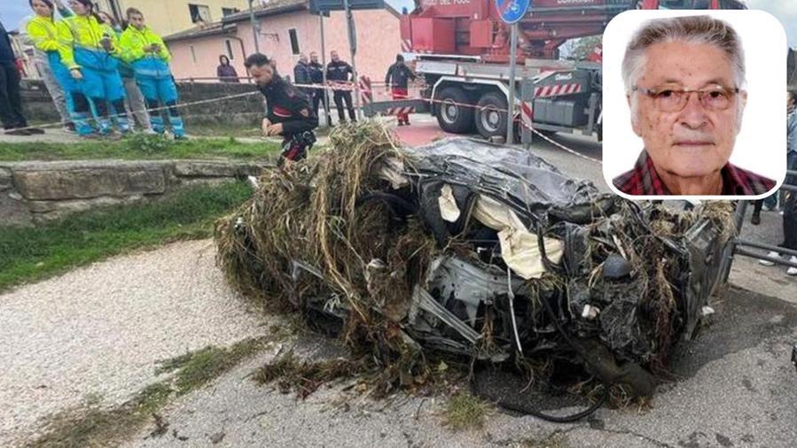 Nella foto in alto Antonio Tumolo morto nell'alluvione a Prato. Nella foto grande ciò che resta della macchina della vittima