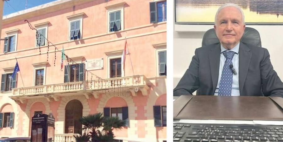 
	Da sinistra il palazzo della Biscotteria e, a destra, Tiziano Nocentini

