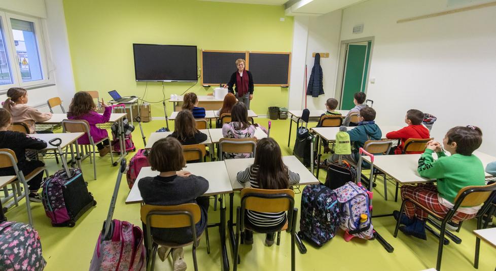 Una lezione di religione in classe (foto  d’archivio)