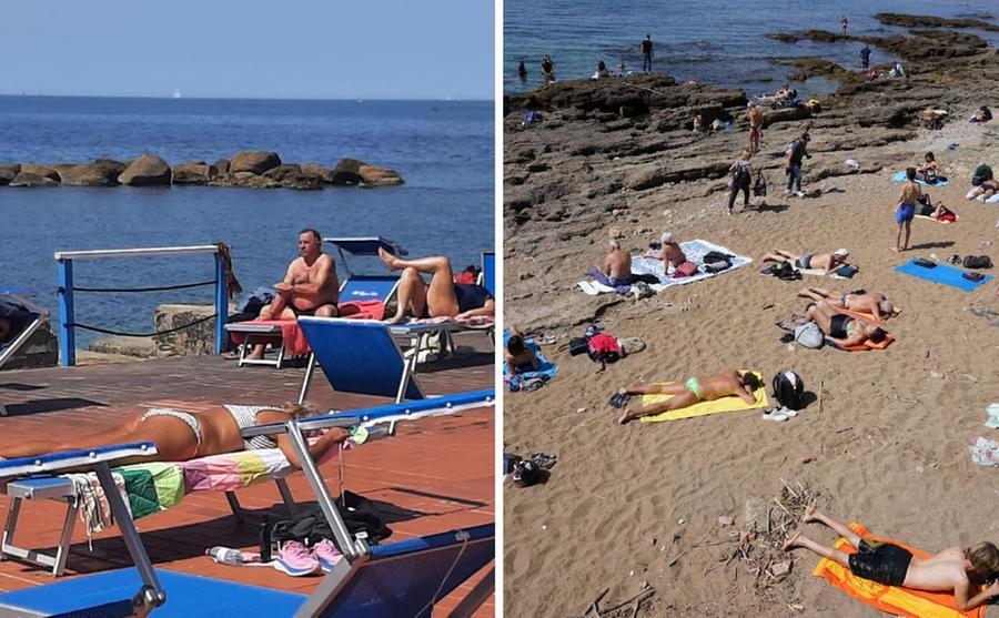 Livorno, è pienone sul lungomare. Tuffi, lettini in spiaggia, ai bagni Lido e Tirreno