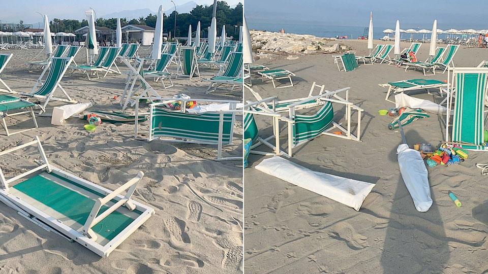 Gli ombrelloni gettati a terra e le sdraio rovesciate