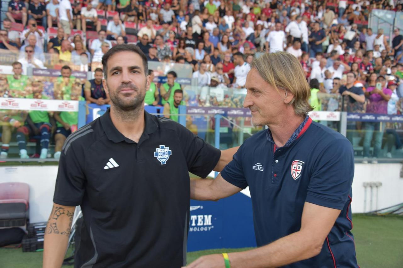 
	Davide Nicola con il collega Cesc Fabregas

