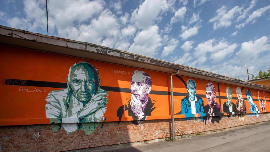 Il murales con i volti che hanno fatto la storia del basket termale e che caratterizzano il playground del PalaVinci (foto Nucci)