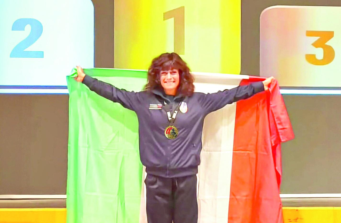 Elena Lorenzoni sul podio del campionato mondiale di karate disputato nella città austriaca di Fustenfeld
