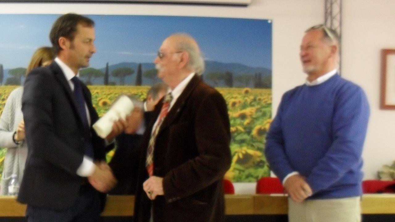 Da sinistra Breda, Cafaggi e Tortelli alla premiazione del 2017