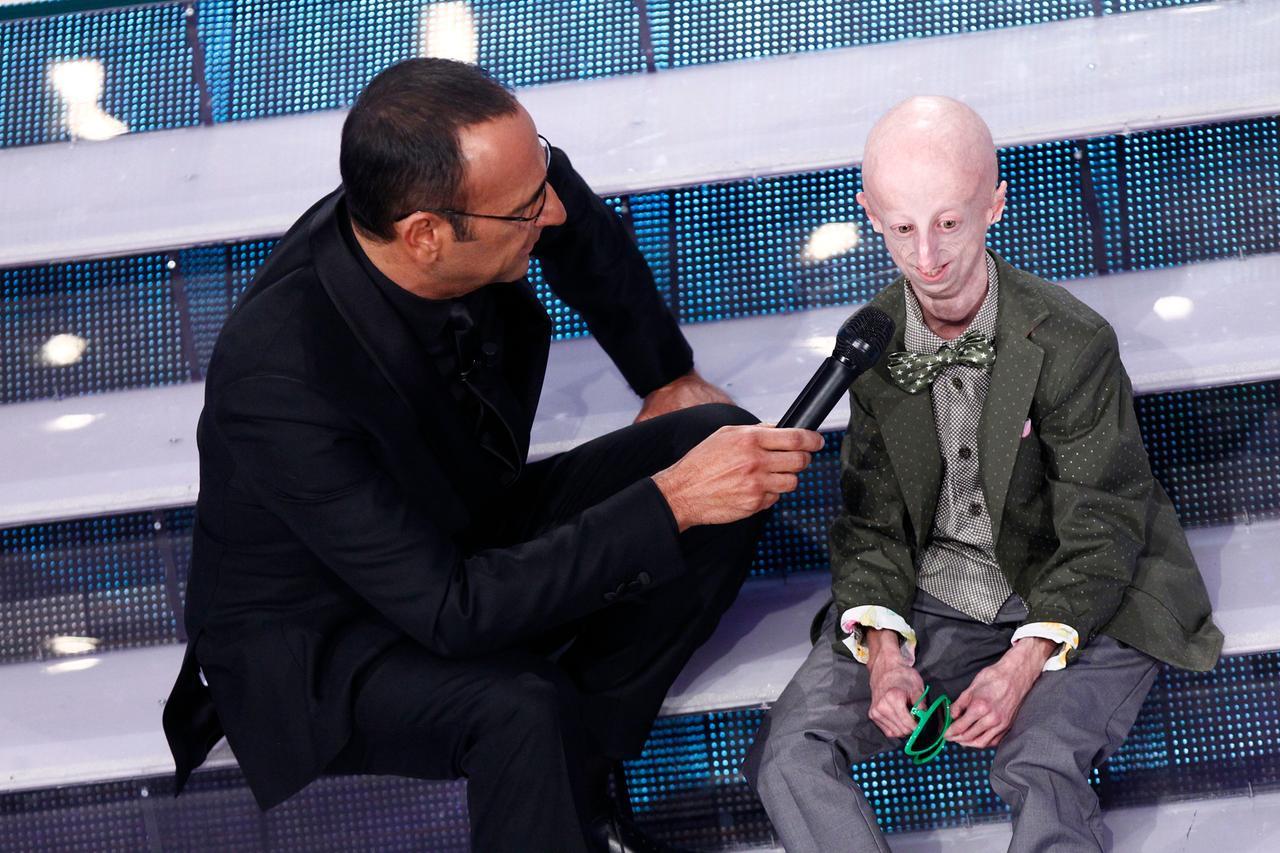 
	Sammy Basso con Carlo Conti a Sanremo nel 2015

