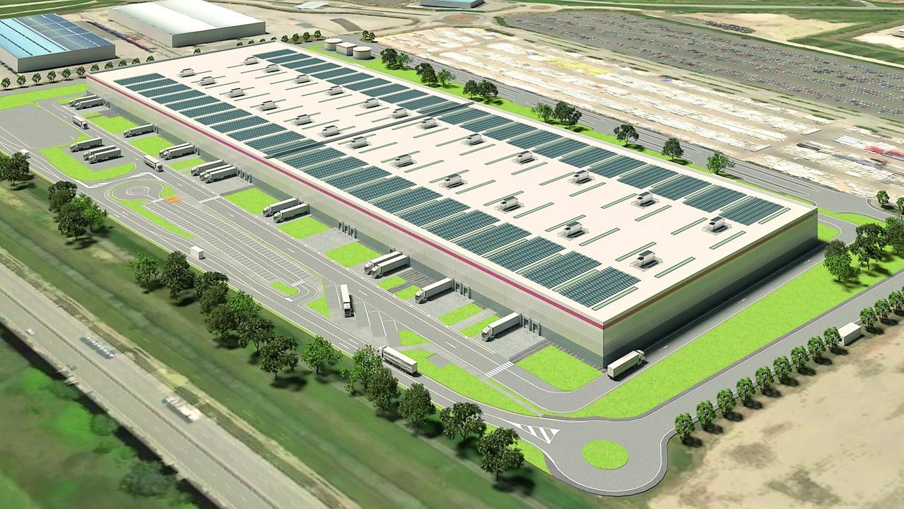 In alto il rendering della struttura prevista nella zona di Guasticce che, secondo le intenzioni, avrebbe dovuto rivoluzionare il trasporto e lo smistamento dei farmaci servendo tutta l’area del centro Italia