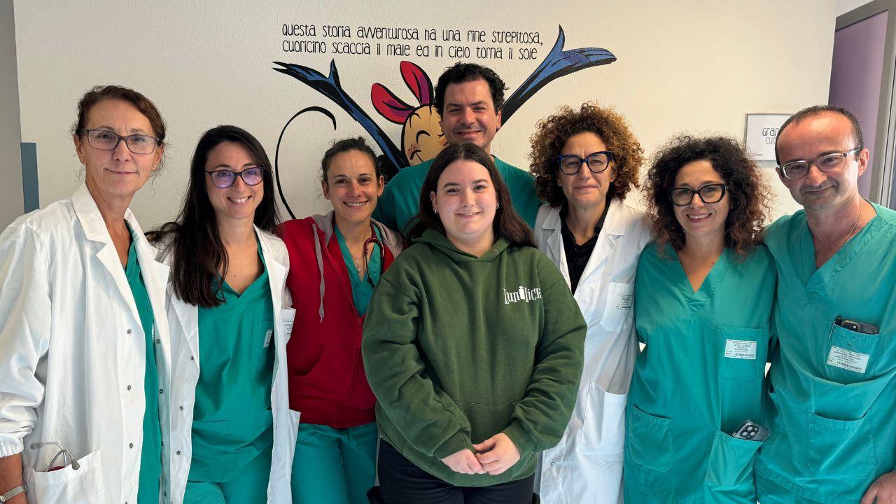 
	Aurora con il team del Monasterio

