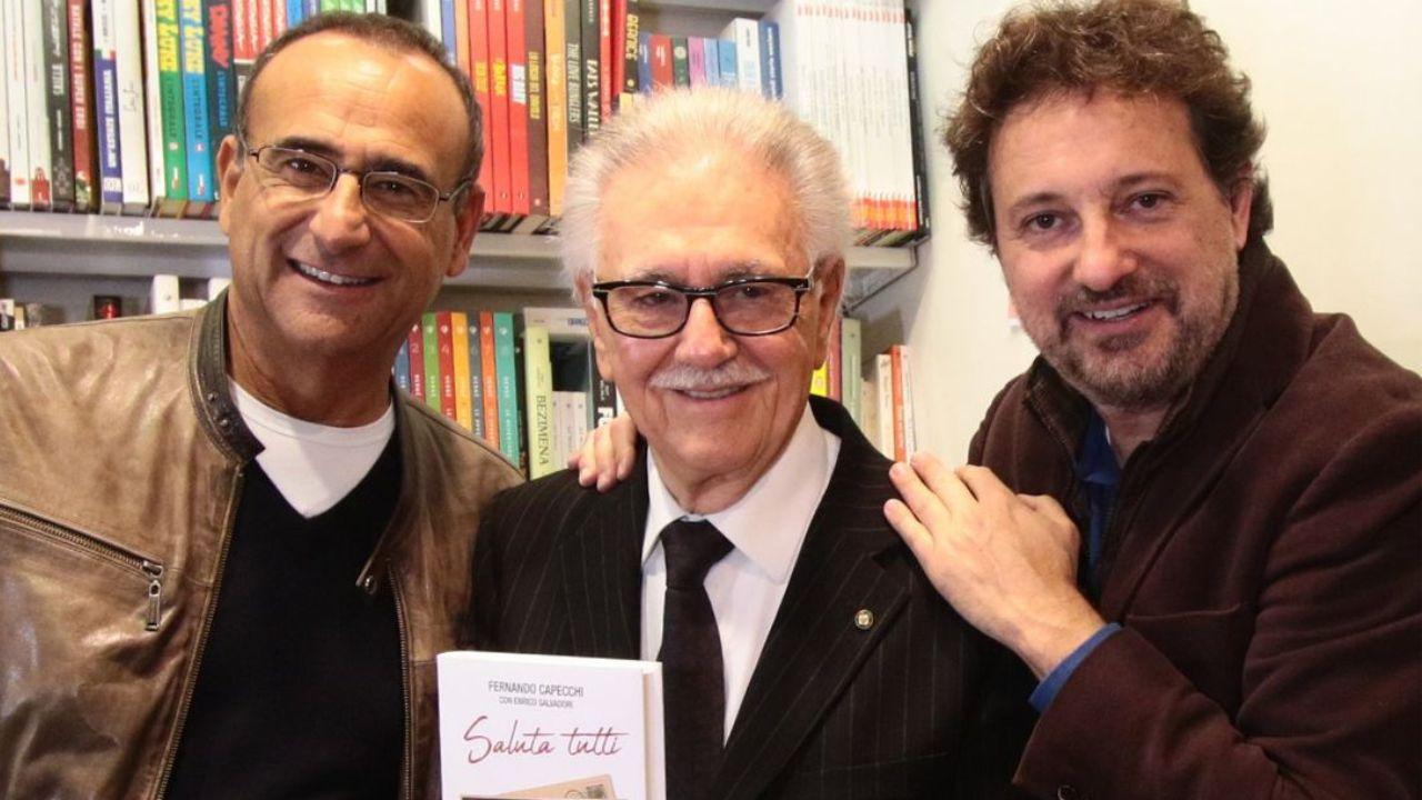 Fernando Capecchi in mezzo a Carlo Conti e Pieraccioni