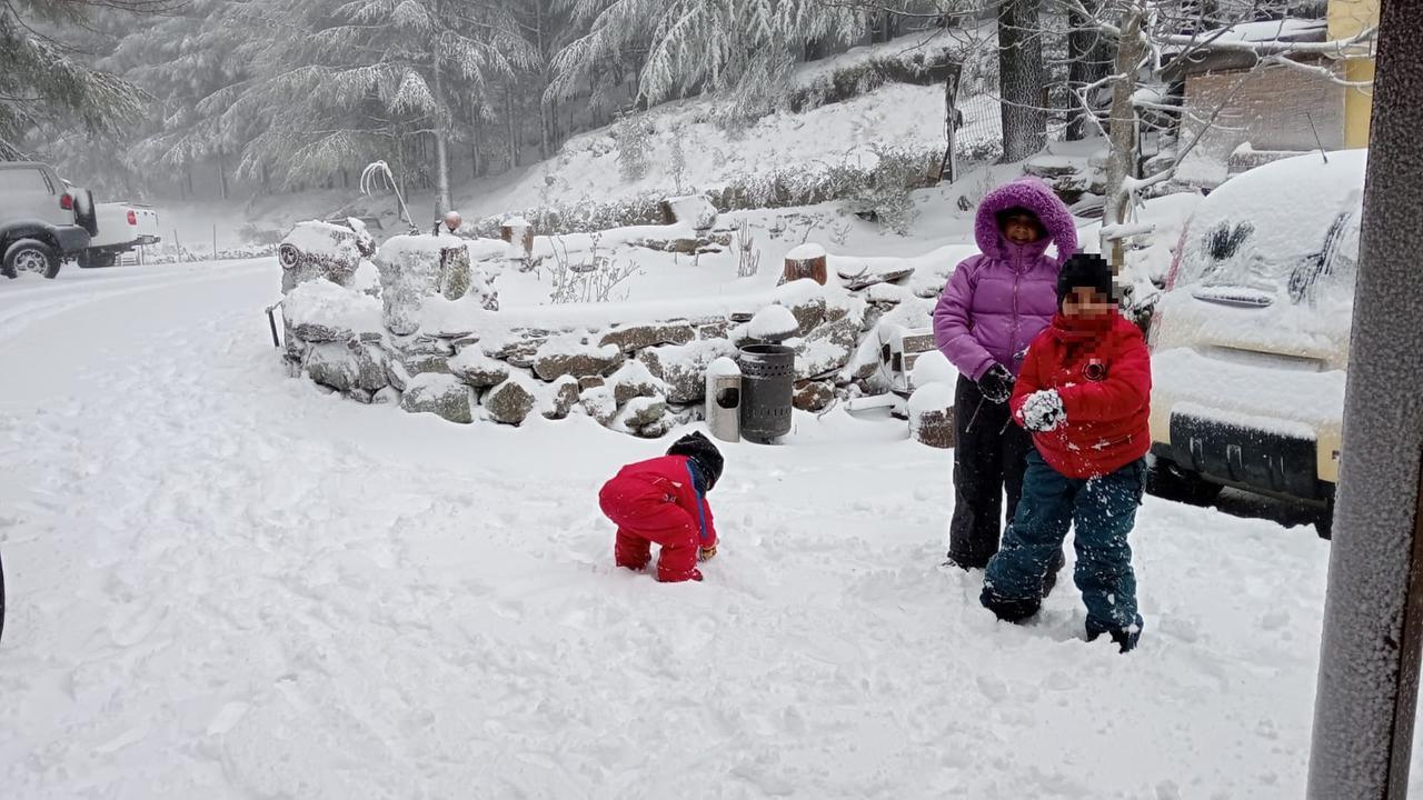 Famiglia sulla neve (<em>Foto di Michela Columbu)</em>