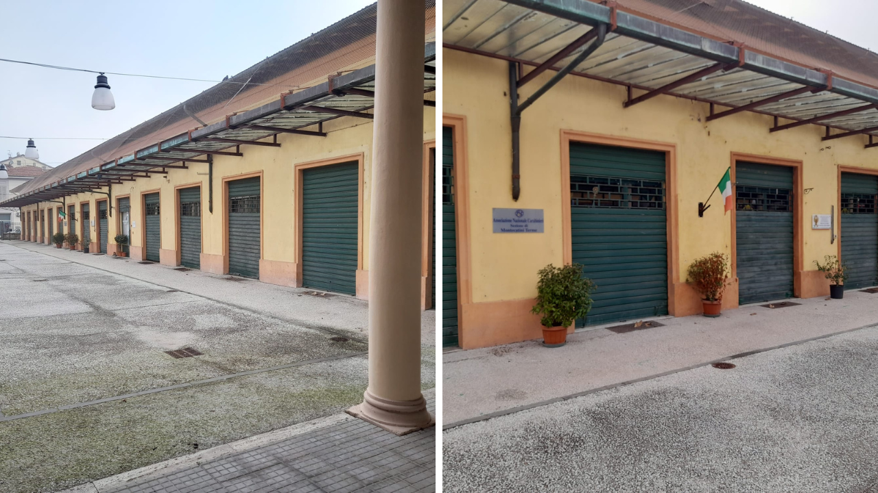 Le diverse saracinesche abbassate sul lato di via Leoncavallo e i fondi occupati dalle sedi delle tre associazioni presenti