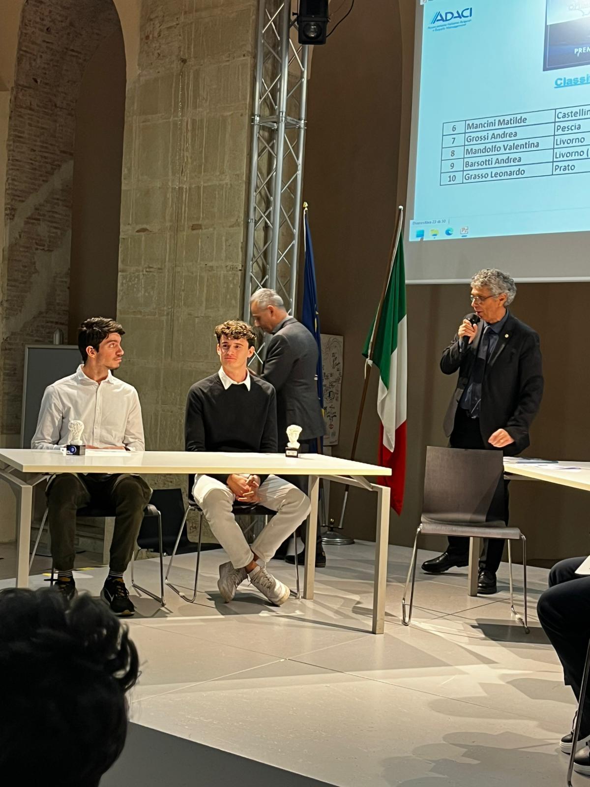 
	A destra Andrea Grossi

