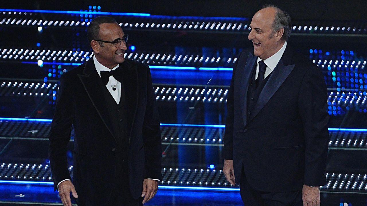 
	Carlo Conti e Gerry Scotti sul palco dell'Ariston

