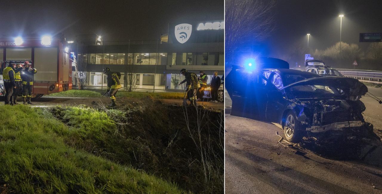 I vigili del fuoco all'opera e l'auto distrutta