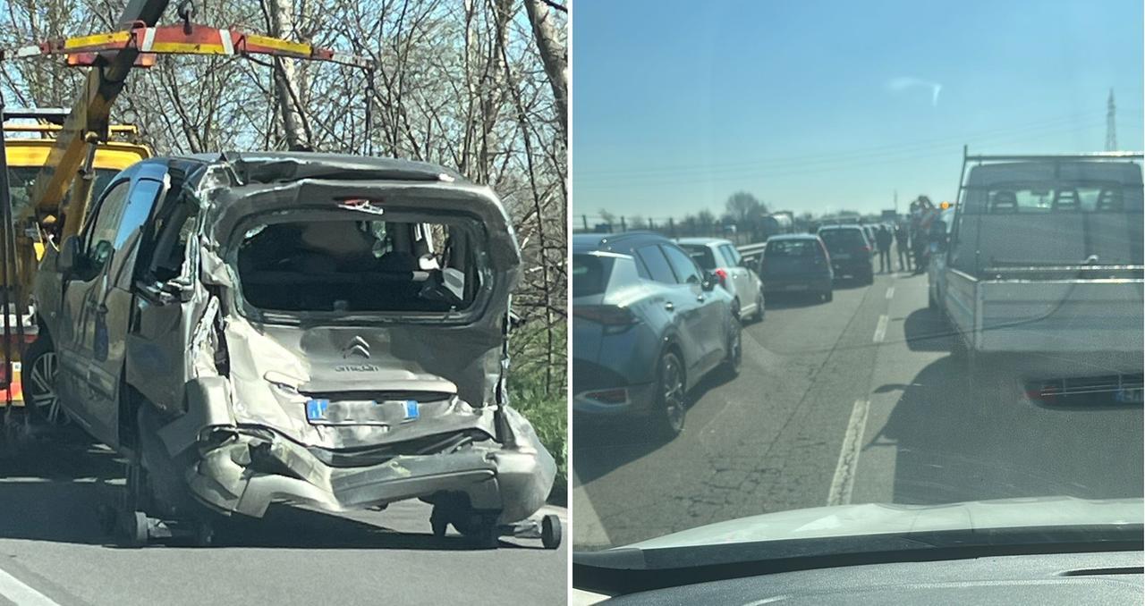
	Un'auto coinvolta nell'incidente e il traffico

