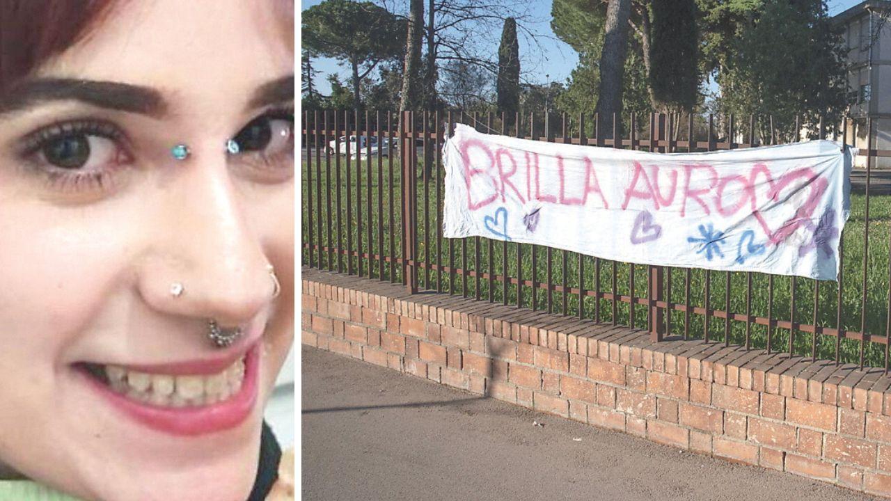 Lo striscione (foto Agenzia Bf) e la 19enne