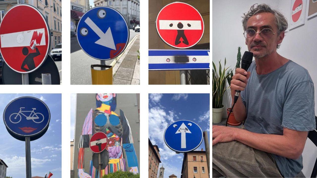 L'arte di Clet sui cartelli a Livorno, a dx l'artista