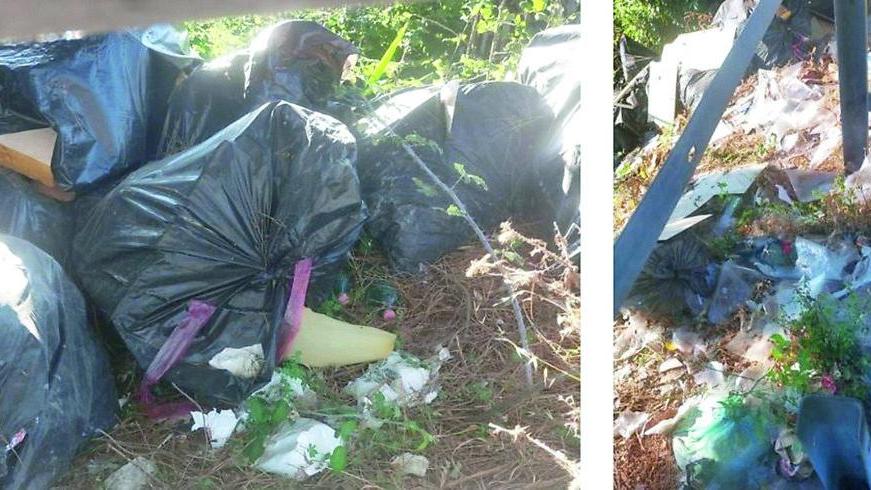 La Variante di Livorno come una discarica: eternit e decine di sacchi di rifiuti oltre il guard rail