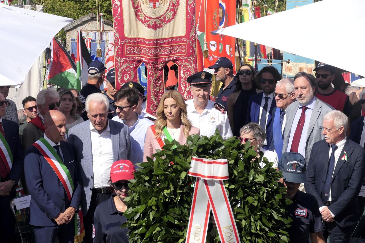 
	La sindaca di Genova, Silvia Salis, il presidente della Regione, Eugenio Giani, alla commemorazione per l'eccidio di Sant'Anna di Stazzema

