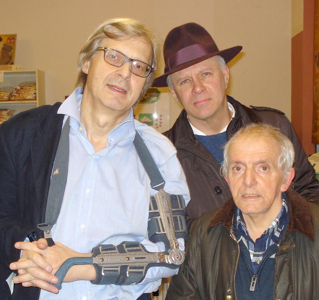 
	In foto da sinistra con il critico d'arte Vittorio Sgarbi, l'artista prof. Marco Cagnolati e Gianni Lai

