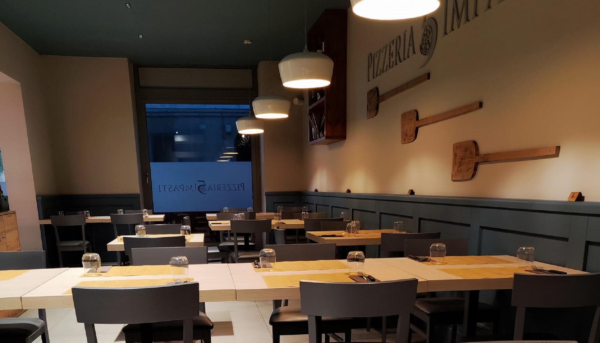 La sala della pizzeria "5 Impasti" di via de Larderel (foto d'archivio)