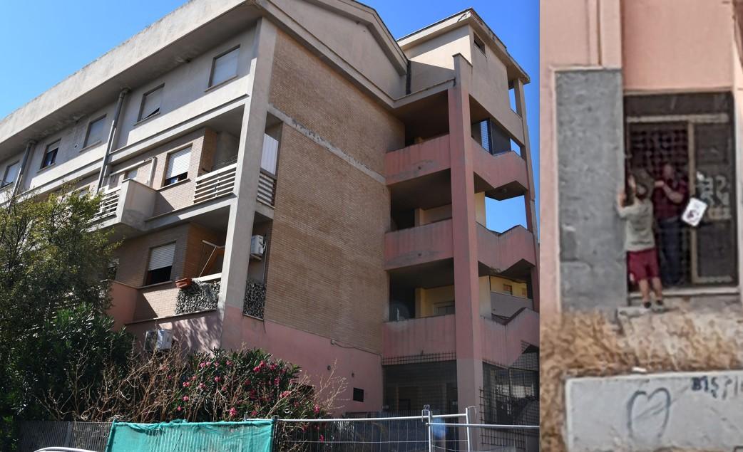 
	Il palazzo di viale Aldo Moro e due uomini che tentano l'accesso nella struttura

