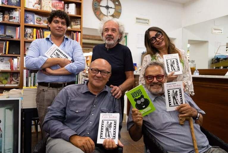 
	I titolari con Oliviero Toscani

