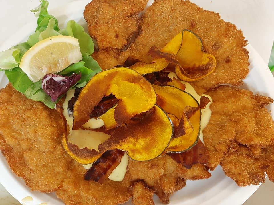 Il mondo raccontato dalla cotoletta: una certezza che attraversa secoli e confini