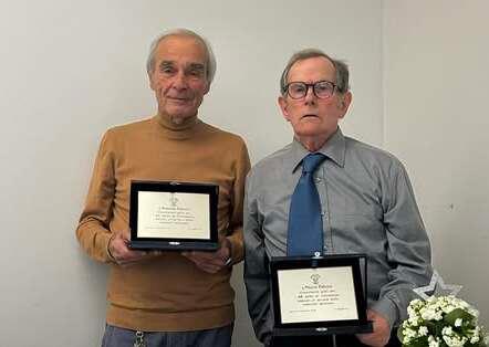 Palandri (a sinistra) con Polvani durante una premiazione