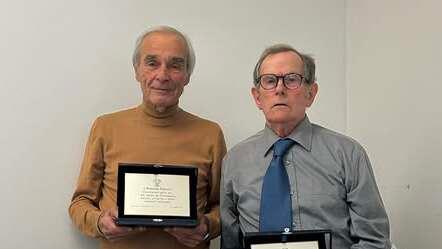 Palandri (a sinistra) con Polvani durante una premiazione