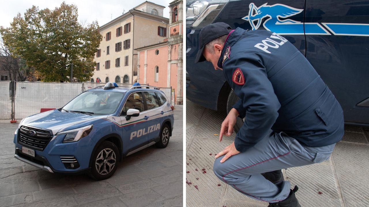 Le tracce di sangue nell’asfalto in centro e la polizia sul posto (fotoservizio Agenzia Bf)