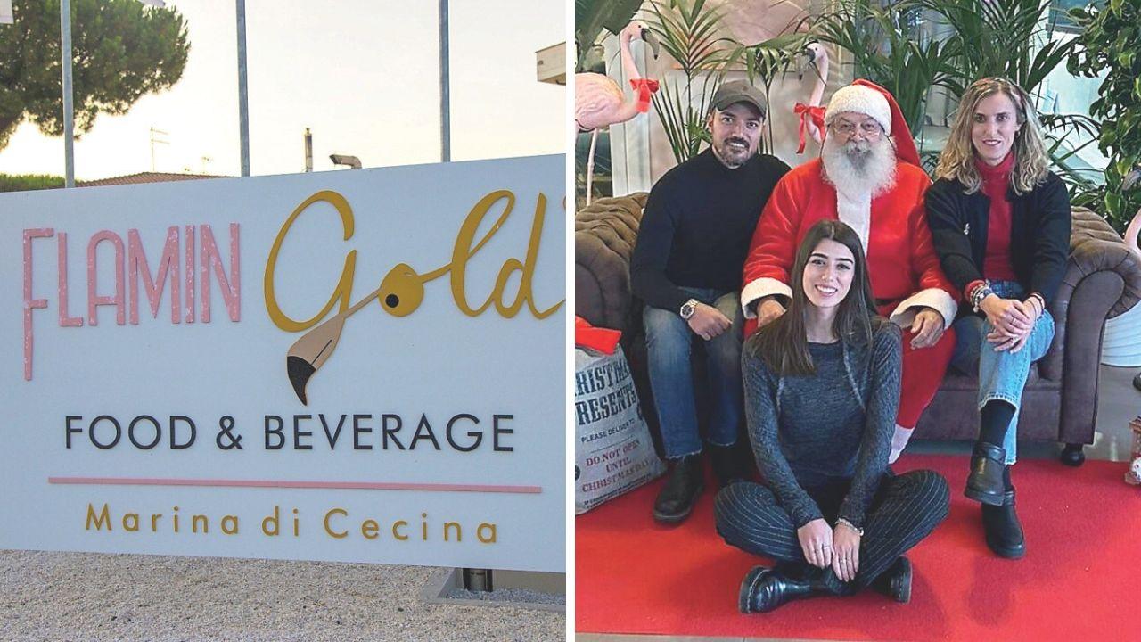 L'insegna della struttura e la famiglia Russo con Babbo Natale