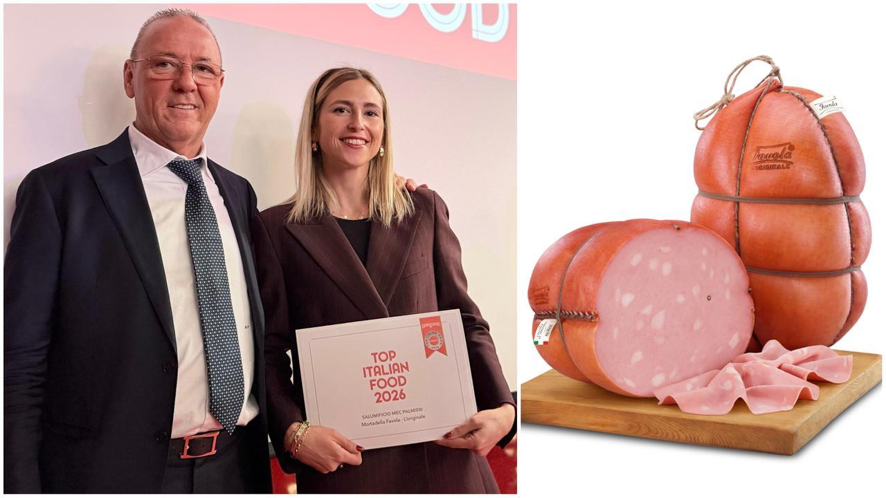 
	Marcello e Margherita Palmieri con il premio

