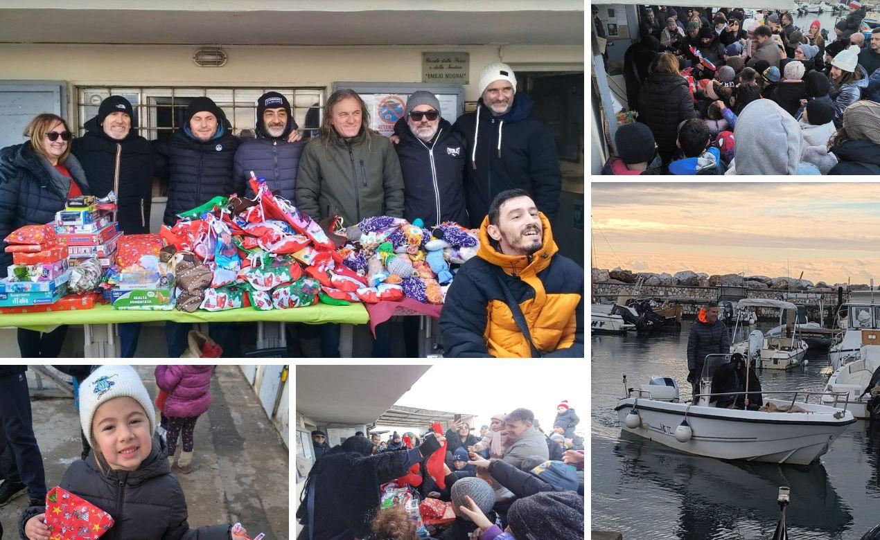 Livorno, la befana vien dal mare: gremito il moletto di Ardenza