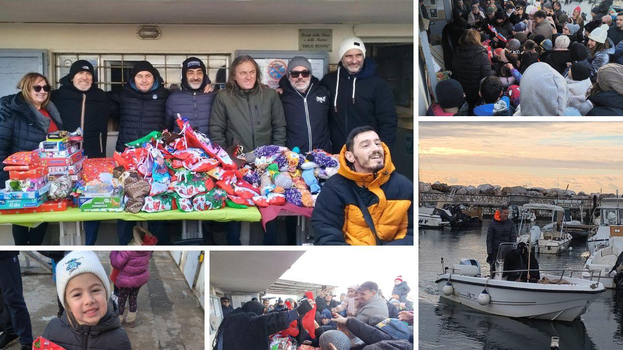 Livorno, la befana vien dal mare: gremito il moletto di Ardenza