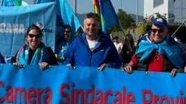 Al centro Massimiliano Bindocci segretario Uilcom Toscan